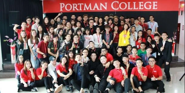PORTMAN College students gathered beneath the College sign