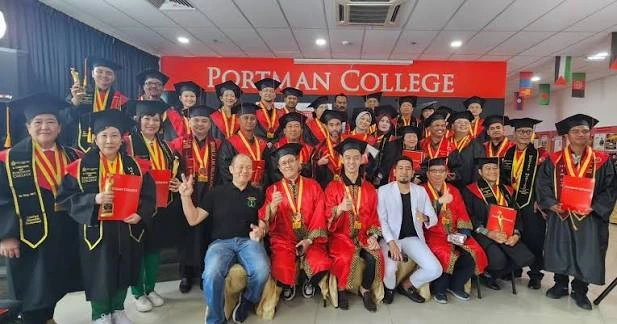 PORTMAN College graduates celebrating at the campus